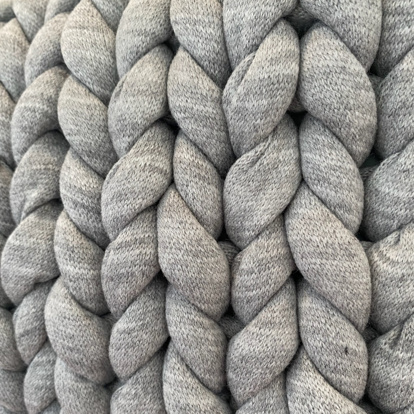 Zierkissen in der Farbe Hellgrau